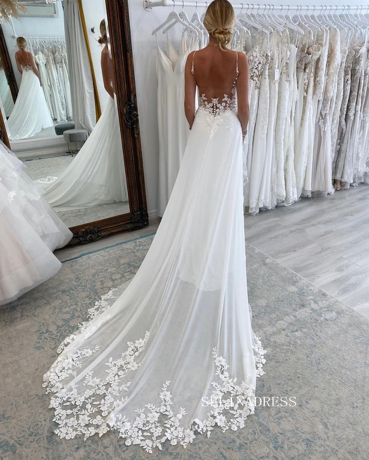 https://www.selinadress.com/cdn/shop/products/chic-spaghetti-straps-romantic-wedding-dresses-open-back-chiffon-bidal-dresses-jkp014_1024x1024@2x.jpg?v=1676358856