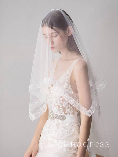 https://www.selinadress.com/cdn/shop/products/lace-hemline-ivory-tulle-wedding-veils-alc010_f893d4ac-3122-484f-ae0d-7a878c3a71ba_grande.jpg?v=1572163351