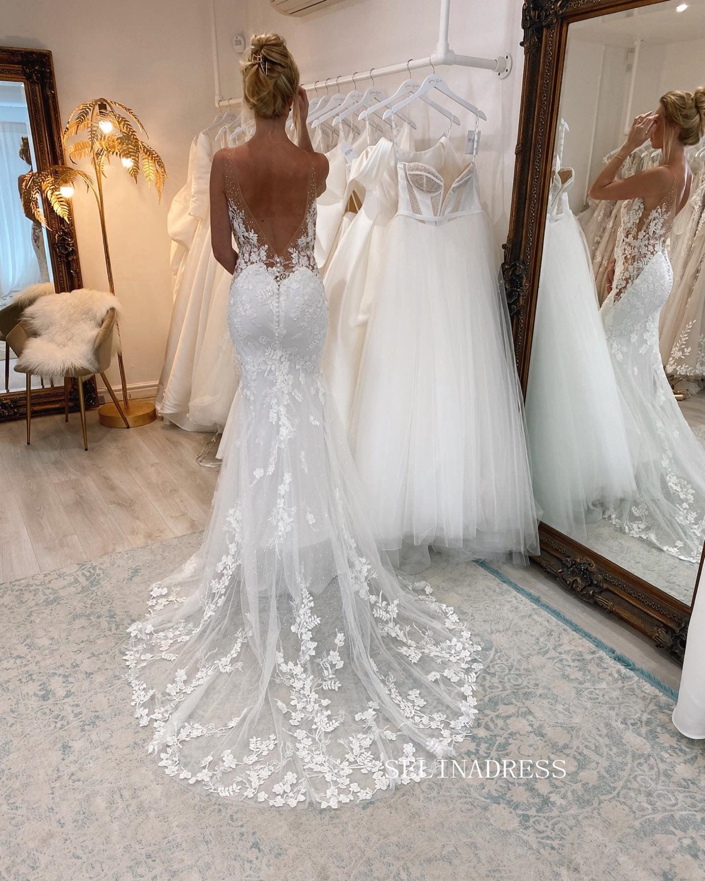 https://www.selinadress.com/cdn/shop/products/mermaid-deep-v-neck-wedding-dresses-romantic-3d-floral-lace-bidal-dresses-jkp015_1_1024x1024@2x.jpg?v=1676359243